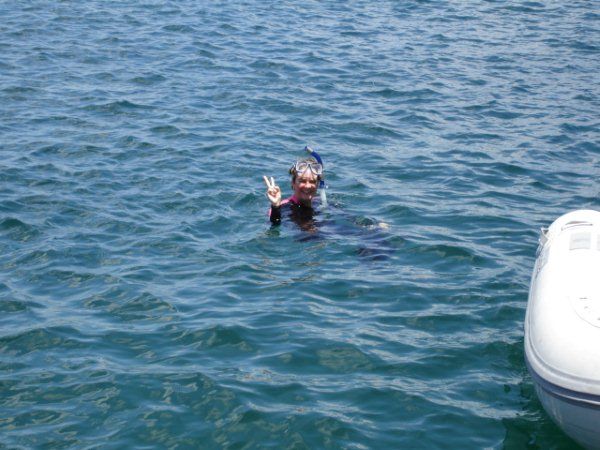 Lynn snorkels Norman Island, BVI.